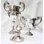 A silver two handled trophy cup with inscription for 'South Brent Show 1919', another for 'Modbury