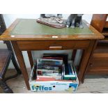 A 76cm vintage sapele wood veneered writing table with green leather inset top and frieze drawer,