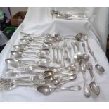 A quantity of matching old continental white metal shell and thread fiddle pattern cutlery including