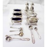 A silver condiment set comprising four salts (1 blue glass liner missing), two mustard pots, two