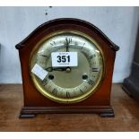 A vintage Smiths polished walnut cased mantel clock with eight day gong striking movement