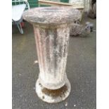 A 77cm high concrete pedestal with fluted sides