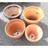 Four assorted terracotta garden pots - sold with a glazed similar