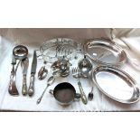 A box containing a quantity of silver plated items including entree dish, toast rack and cutlery,