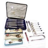 A cased set of six silver handled tea knives, silver sugar tongs and silver handled shoehorn and