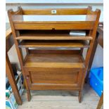 A 58cm Edwardian polished oak freestanding bookcase with trough to top, pull-out surface, open shelf