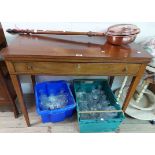 A 98cm 19th Century mahogany fold-over tea table with long frieze drawer and double gated action,