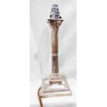 A 27.5cm silver Corinthian column candlestick converted into a table lamp with applied light fitting