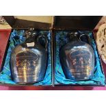 Two boxed ceramic Highland Malt Whisky flagons made as souvenirs of the QE2