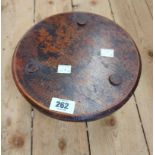 A Victorian stained pine low milking stool with fern ware decoration to top