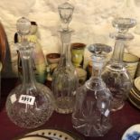 Four 19th Century glass decanters and stoppers