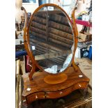 An Edwardian mahogany and strung platform dressing table mirror with oval plate and three drawers to