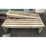 A pair of 1.3m pine garden benches with slatted seats