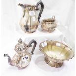 A Danish white metal harlequin four piece tea set all with similar embossed ribbed decoration -