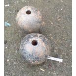 A pair of old cast iron finials of ball form