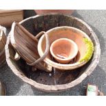 A garden planter converted from an oak barrel - sold with two terracotta plant pots and an old