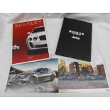 A small collection of car sales brochures including Bentley, Jeep and Mini