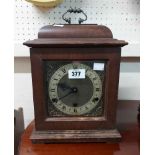 A 20th Century stained walnut cased bracket clock with Perivale (British) eight day chiming