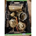 A crate containing a quantity of assorted metalware including brass kettles, jug, etc.