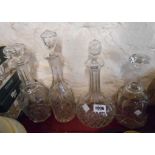 Four 19th Century glass decanters and stoppers