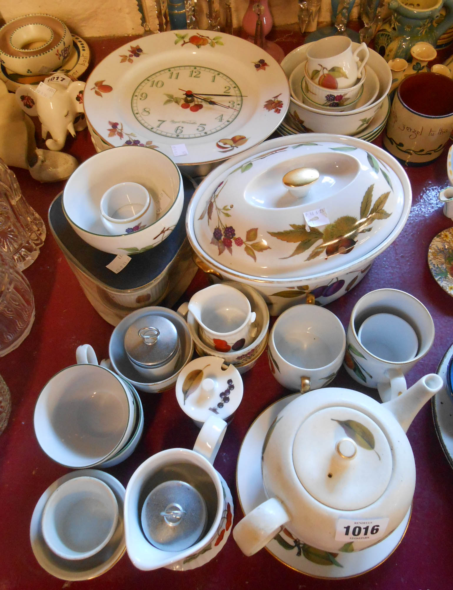 A large quantity of Royal Worcester Evesham oven-to-table ware including flan dishes, lidded