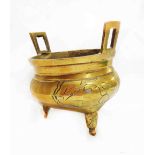 A small Chinese cast brass censer with moulded six character seal mark and panelled decoration