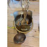 A brass helmet coal scuttle - sold with a quantity of fire irons and a copper ladle