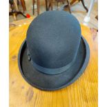 A vintage Moores Tween bowler hat with interior label for George Boyle Ltd. of Bideford
