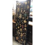 A vintage three fold dressing screen with decoupage decoration