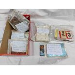 A box containing a collection of USSR, Imperial Russia and Russian Federation postcards and postal