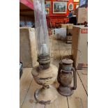 A box containing an old Aladdin oil lamp with glass chimney - sold with a hurricane lamp