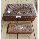 An old carved wooden lift-top work box with floral decoration, a smaller similar and a Japanese