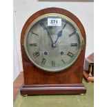 An Edwardian mahogany and strung cased dome top mantel clock with silvered dial and Empire eight day