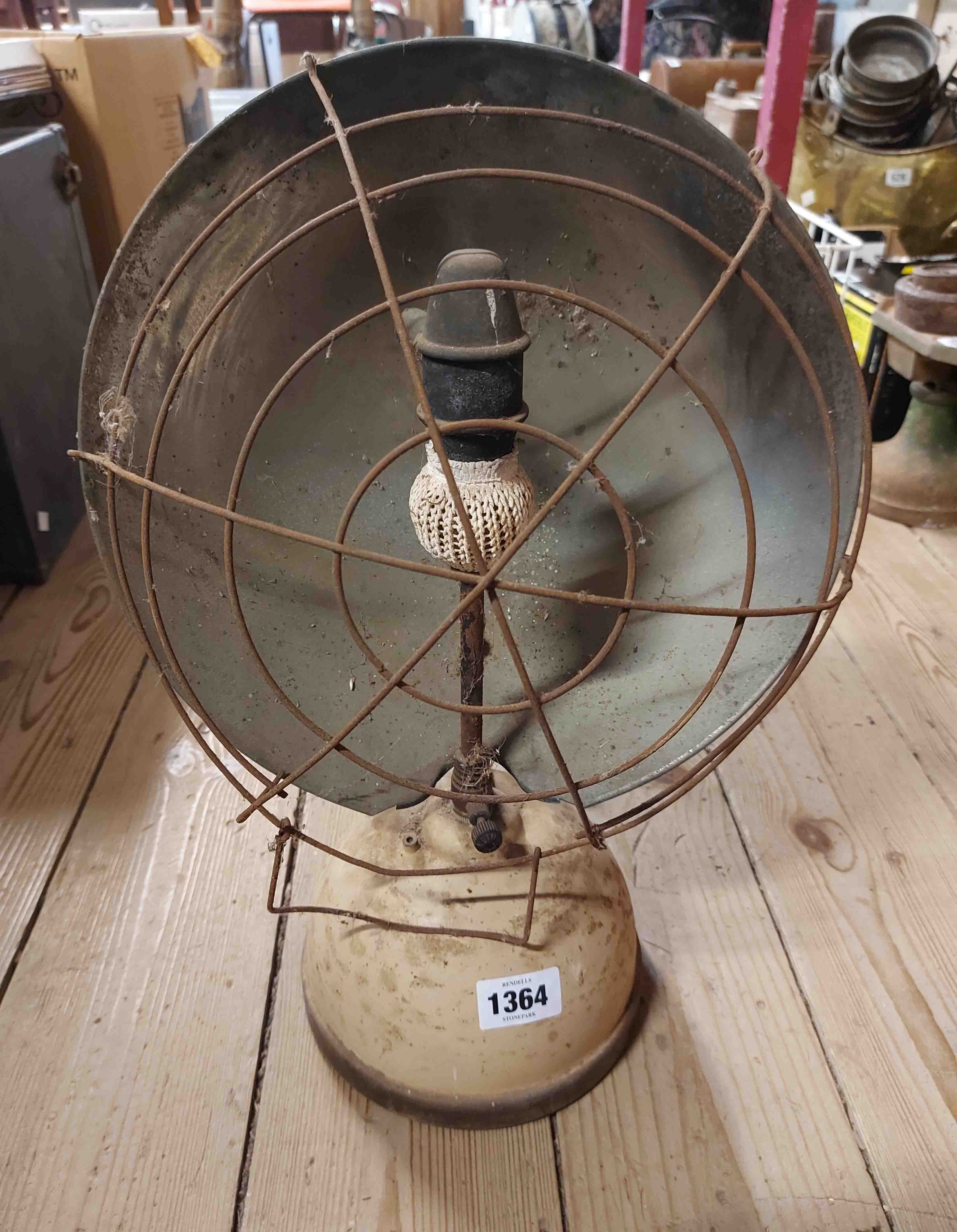 An old Tilly lamp with large reflector