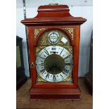 A reproduction mahogany cased bracket clock with arched dial marked for E.J. Goodfellow, Wadebridge,
