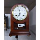 A reproduction mahogany dome cased mantel clock with Franz Hermle & Sohn 'ting-tang' bell striking