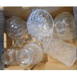 A box containing a small quantity of glassware including decanters, etc.