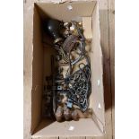 A box containing a quantity of assorted metal items including coat hook, wrought iron door bolt,