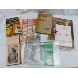 A box containing a small collection of publications, autograph album, etc.