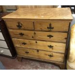 A 95cm Edwardian pine chest of drawers with elm plank top, two short and three long graduated