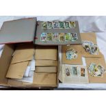 A box containing a large collection of loose Brooke Bond tea cards in named envelopes, others in