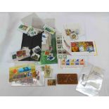 A small collection of GB and world stamps, also an Italian carved wood stamp case with 'Tarvis' (