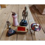 A box containing six vintage table lighters including musical, knight pattern example set on