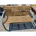 A 1.22m modern slatted painted wood garden bench, set on metal ends