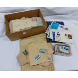 A box containing world stamps and FDCs, loose, in album and on paper