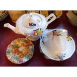 A Tuscan china Art Deco part tea set comprising teapot, cup, saucer, plate and spare saucer - sold
