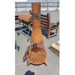 A metal and mesh Chimenea - rusted