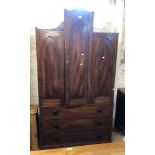 A 1.13m 19th Century mahogany Gothic style two part linen press with central mitre shaped folding