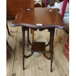 A 42.5cm Edwardian mahogany two tier occasional table, set on slender turned supports