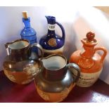 Two Doulton Lambeth salt glaze stoneware harvest jugs (one with chip to rim) - sold with two ceramic